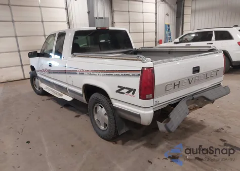 1997 Chevrolet K1500 Fleetside из США, поврежденный, VIN 2GCEK19R2V1159539